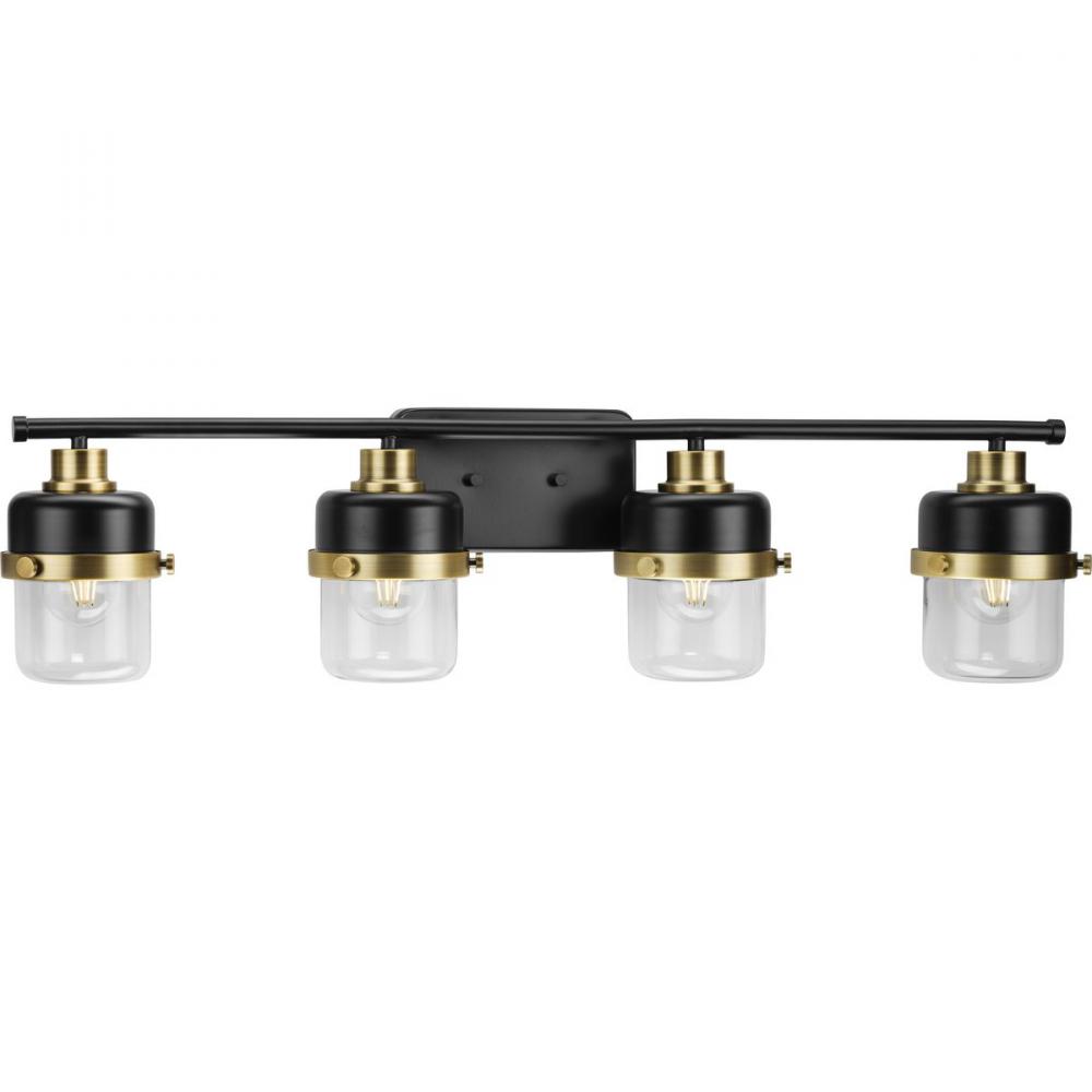 Beckner Collection Four-Light Matte Black Clear Glass Urban Industrial Bath Light with Vintage Brass